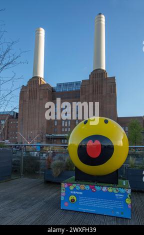 Battersea Power Station Chimneys London with a smiley face on a sunny day Stock Photo