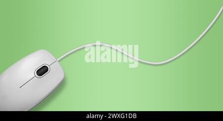 Light gray computer mouse with a wire on a green background. Close-up, top view Stock Photo