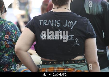 Sydney, Australia. 31st March 2024. Trans Day of Visibility Rally 2024 organised by Pride in Protest. Protesters assembled at Newtown Hub/Pride Square where speakers addressed the rally before they marched along King Street to Sydney Park, St Peters. Credit: RM/Alamy Live News Stock Photo