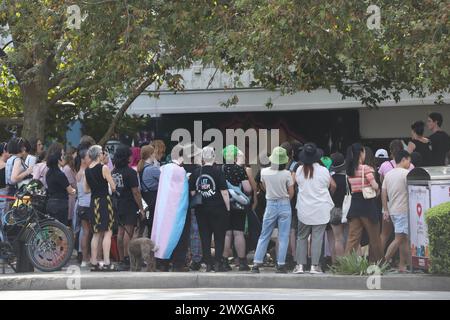 Sydney, Australia. 31st March 2024. Trans Day of Visibility Rally 2024 organised by Pride in Protest. Protesters assembled at Newtown Hub/Pride Square where speakers addressed the rally before they marched along King Street to Sydney Park, St Peters. Pictured: protesters at Newtown Hub/Pride Square. Credit: RM/Alamy Live News Stock Photo