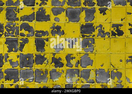 Yellow Old Peeling Bright Paint Abstract Vibrant Square Mosaic Pattern Glass Surface Texture Background Structure. Stock Photo