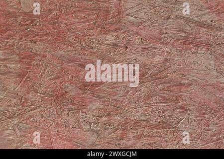 Red Paint Press Wood Texture Osb Background Building Material Surface Construction Surface. Stock Photo