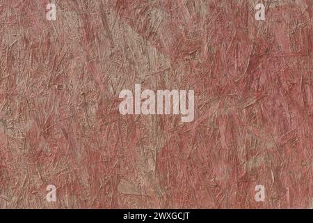 Red Paint Pressed Wood Texture Osb Background Building Material Surface Construction. Stock Photo