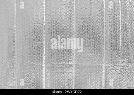 Silver color transparent bubble film surface texture background packaging light. Stock Photo