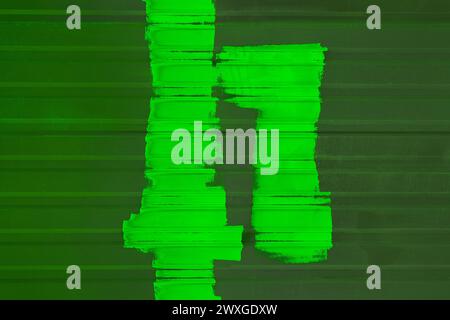 Green paint abstract pattern brush stroke on metal wall fence blank space design text background empty. Stock Photo