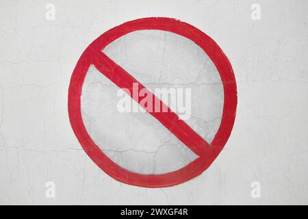 Object Prohibiting Car Sign Traffic Symbol Stopping Prohibited On Wall. Stock Photo