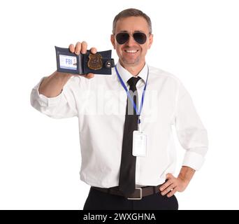 Mature FBI agent showing document on white background Stock Photo