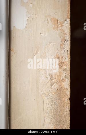 rough old concrete wall texture closeup during home renovation. Stock Photo