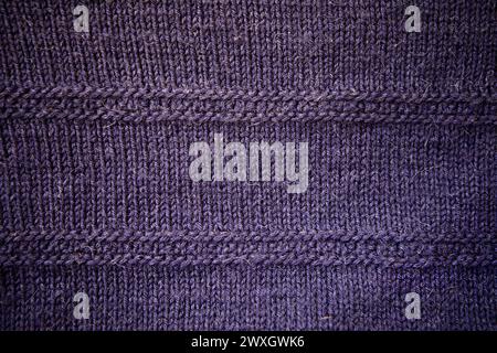 Handmade dark blue knitting wool texture background. Stock Photo
