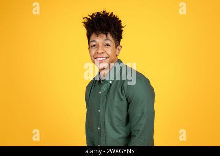 Happy young black man smiling brightly Stock Photo