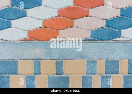 Two Kinds Paving Colored Tiles Dividing Border Curb Mosaic Stone Street Road City Texture Background Colorful Top View. Stock Photo