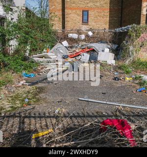 Dumped Rubbish on waist ground Stock Photo
