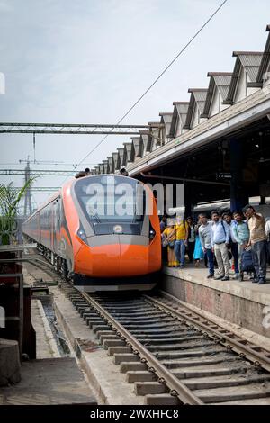 Vande Bharat Express standing at a Junction Railway Station of Indian Railways system in Howrah, West Bengal, India on March 19, 2024. Stock Photo