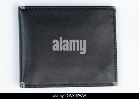 Closed wallet from black leather front view isolated on white studio background Stock Photo