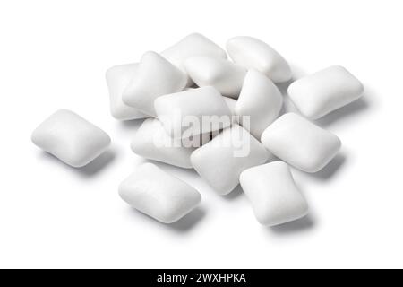 Heap of white chewing gum pieces close up isolated on white background Stock Photo