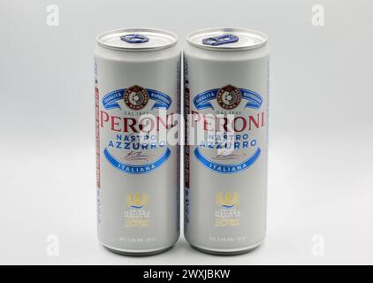 Kyiv, Ukraine - March 15, 2023: Studio shoot of Peroni Nastro Azzurro Italian beer cans closeup on white. Stock Photo