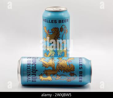 Kyiv, Ukraine - April 01, 2023: Studio shoot of Wolters Pils German beer cans cans closeup on white. Lowenbrau is a brewery founded in Munich around 1 Stock Photo