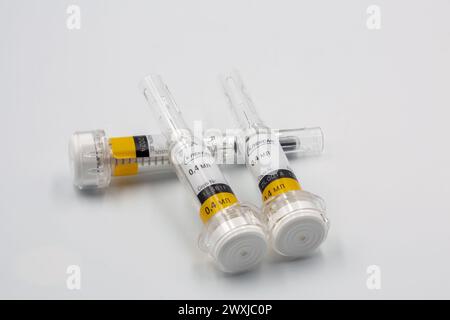 Kyiv, Ukraine - December 18, 2023: Clexane 40 mg Sanofi syringes pre filled solution for injectio and injection needle with automatic safety system cl Stock Photo