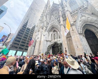 New York City, United States. 31st March, 2024. Thousands of people gather in Midtown East for the annual Easter Parade in New York City. Each year New Yorkers put on their most creative hats and outfits and stroll down Manhattan's Fifth Avenue on Easter Sunday.  Credit: Ryan Rahman/Alamy Live News Stock Photo