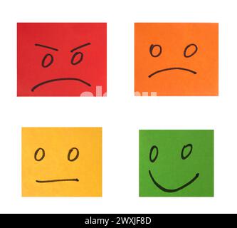 Multi-colored paper stickers with emotions on a white background, evaluation and rating Stock Photo