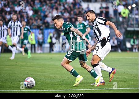 Athens, Lombardy, Greece. 31st Mar, 2024. 10 BERNARD of Panathinaikos FC competing with 19 JONNY CASTRO of PAOK FC during the Greek Super League, Play Offs, match between Panathinaikos FC and PAOK FC at Apostolos Nikolaidis Stadium, on March 31, 2024, in Athens, Greece (Credit Image: © Stefanos Kyriazis/ZUMA Press Wire) EDITORIAL USAGE ONLY! Not for Commercial USAGE! Stock Photo