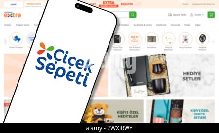 Istanbul, Turkey - 27 March 2024: Ciceksepeti logo on smartphone screen with its website in background. Cicek Sepeti is an online flower and gift deli Stock Photo