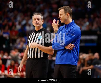 Dallas, Texas, USA. 31st Mar, 2024. Duke head coach JON SCHEYER talks with referee Doug Sirmons during the NCAA Men's Basketball Tournament Regional Final game between Duke and NC State on March 31, 2024. NC State upset Duke, 76-64, to advance to the Final Four. (Credit Image: © Scott Coleman/ZUMA Press Wire) EDITORIAL USAGE ONLY! Not for Commercial USAGE! Stock Photo