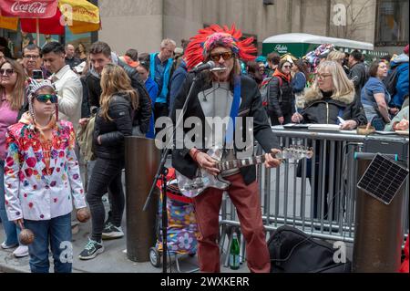 New York, New York, USA. 31st Mar, 2024. (NEW) 2024 New York City. (Credit: M10s/TheNews2)Easter Bonnet Parade. March 31, 2024, New York, New York, USA: A man preforms at the Easter Parade and Bonnet Festival 2024 outside St. Patrick's Cathedral along Fifth Avenue on Easter Sunday, March 31, 2024 in New York City. (Credit: M10s/TheNews2) (Foto: M10s/Thenews2/Zumapress) (Credit Image: © Ron Adar/TheNEWS2 via ZUMA Press Wire) EDITORIAL USAGE ONLY! Not for Commercial USAGE! Stock Photo