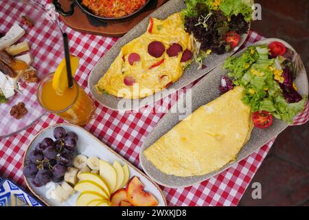 Egg Omelette with sausage on a breakfast table  Stock Photo