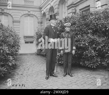 Mr. Bernard Baruch and Rear Admiral Cary T. Grayson, aide and medical advisor to President Wilson in front of the King's Palace. Brussels, Belgium ca. June 1919 Stock Photo