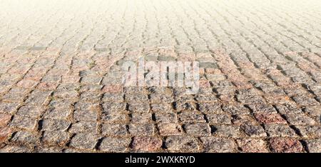The texture of stone pavement tiles cobblestones bricks background Stock Photo