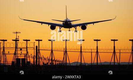 Richmond, British Columbia, Canada. 29th Mar, 2024. A British Airways Airbus A350-1000 jetliner (G-XWBI) lands at sunset, Vancouver International Airport. (Credit Image: © Bayne Stanley/ZUMA Press Wire) EDITORIAL USAGE ONLY! Not for Commercial USAGE! Stock Photo