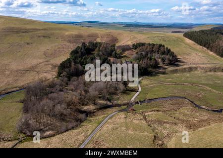 Aerial drone view of Towford south of Jedburgh in the Cheviot Hills. Dere street Roman road passes through this valley. Stock Photo