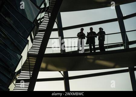 Berlin, Germany. 31st Mar, 2024. Dusk in the dome of the Reichstag. Credit: Guy Bell/Alamy Live News Stock Photo