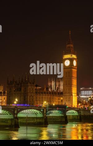 London, UK; April 03, 2024 - A view of the Westminster Bridge, Big Ben and the houses of Parliament, London, UK in the evening. Stock Photo