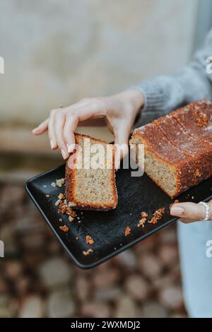 Guten free, vegan lemon drizzled almond loaf in a local bakery Stock Photo