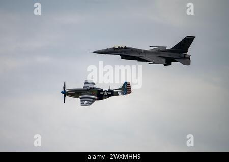 U.S. Air Force Lt. Col. Charles “Tuna” Hainline (ret.), Air Force Heritage Flight P-51 Mustang pilot, left, and Capt. Taylor “FEMA” Hiester, F-16 Stock Photo