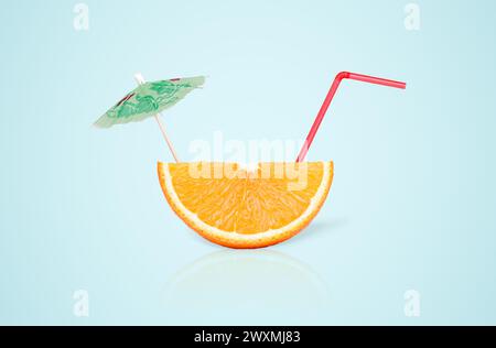 Summer sweet orange slice juice, food minimal concept. Light blue gradient background Stock Photo