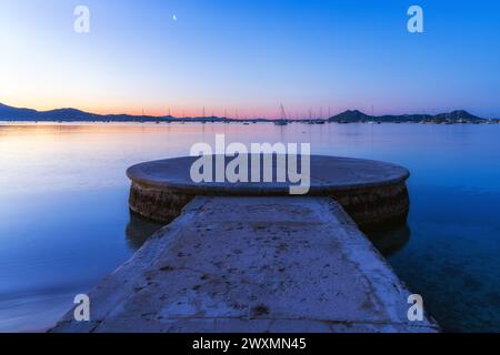 Sunrise at Platja d'Albercutx in the bay of Port de Pollenca on Mallorca, Spain Stock Photo