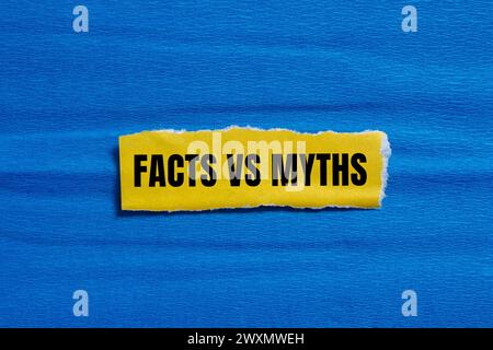 Facts vs myths words written on yellow torn paper with blue background. Conceptual symbol. Copy space. Stock Photo