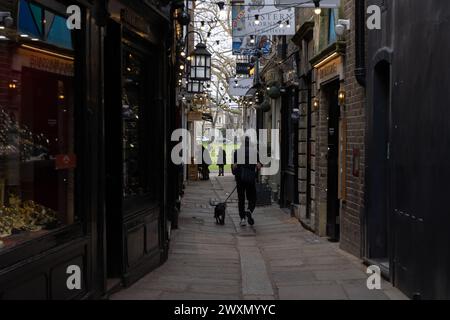 Brewers Lane alleyway with its bustling shops and cafes that connects George street in central Richmond, London, to Richmond Green Stock Photo