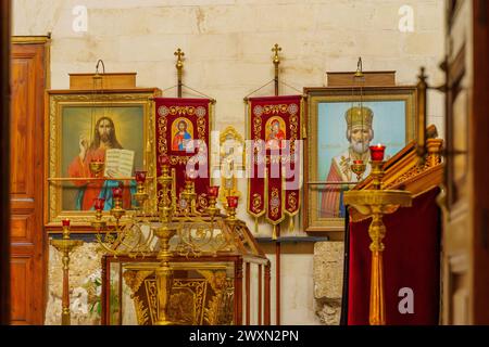 Jerusalem, Israel - March 29, 2024: View of various icons in the Alexander Nevsky Church, Russian orthodox church in the Old city of Jerusalem, Israel Stock Photo