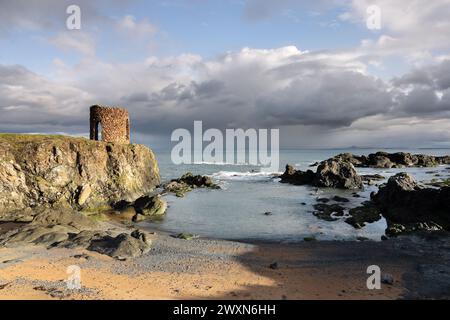 Lady’s Tower illuminated by late afternoon light, Ruby Bay, Elie, Fife, Scotland, UK Stock Photo