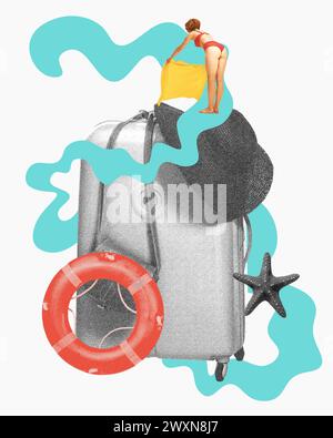 Young woman in swimsuit putting towel for sunbathing, monochrome suitcase and hat items, swimming circle. Summer relaxation on beach. Contemporary art Stock Photo
