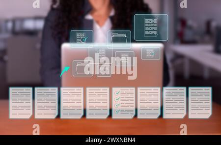 Concept: Software for searching, archiving and managing corporate documents, data and files. Executive woman manages document management system (DMS). Stock Photo