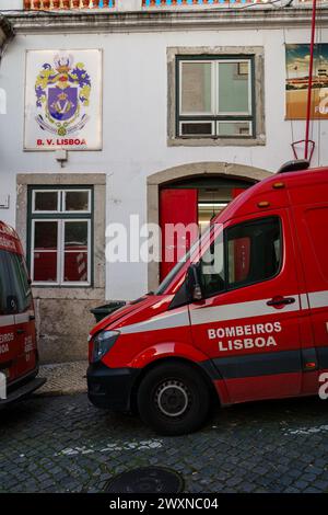 Red Fire Department Van Parked Outside Fire Station in Lisbon, Portugal. February 2, 2024. Stock Photo