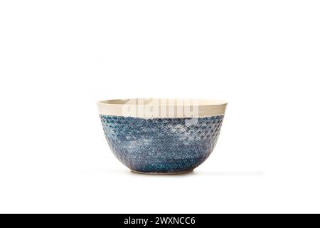 A white and blue ceramic bowl on a white background with copy space Stock Photo