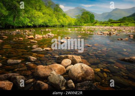 Breathtaking green highland landscape with reflective pools in the ...