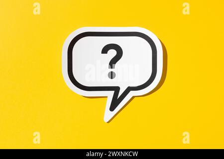 Question mark on speech bubble isolated on yellow background. Doubt, confusion, uncertainty concept Stock Photo