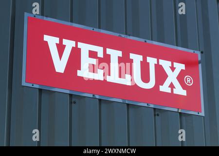 Saint Georges, France - January 21, 2024: Velux logo on a wall. Velux is a Danish company that specializes in windows and skylights Stock Photo